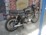 Sayre's 1973 Honda CB350F. Not the best pic. When it left it had clip-ons, and a Kerker header with reverse cone megga. Not fast, but sounded sweet.