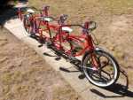 Check out the steering from all three locations and the balanced front brake. Forks are custom fabricated. Floating truss under the frame prevents flex.