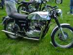 My "basketcase" Triumph Cafe Racer named "The Prom Queen",by a friend