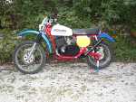 This is a Replica of the 1975 Rokon ISDT works bike.  It is made from 1975 and 1976 MX and RTII production parts. Left side